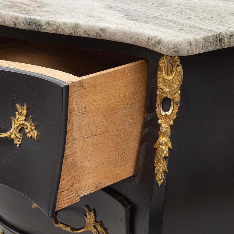 A Rococo style chest of drawers, mid 20th Century.