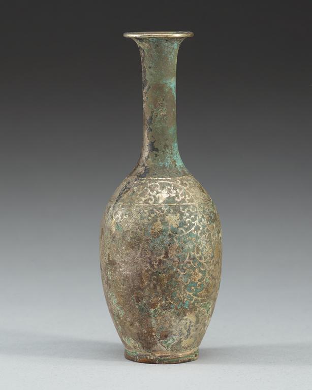 A silvered metal vase, presumably Tang dynasty.