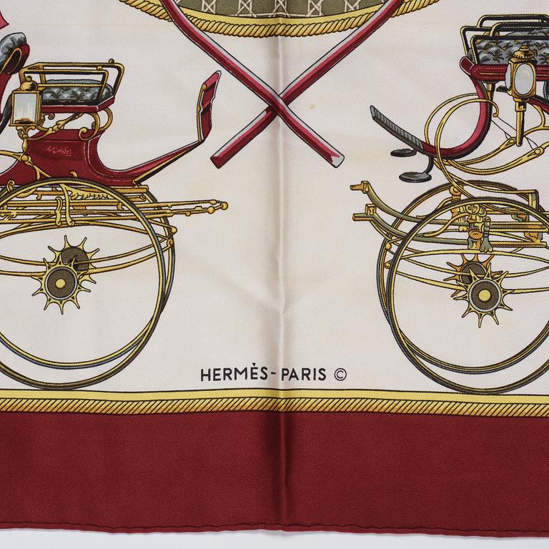 Hermès, a 'Les Voitures a Transformation' silk scarf.