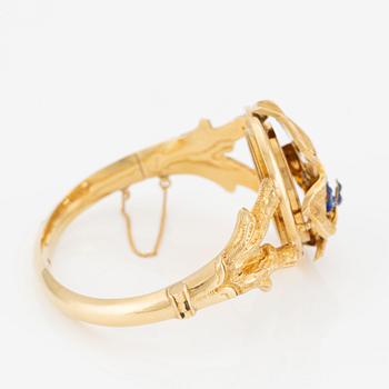 Armring, 18K guld med emalj, med fotogömma, 1800-tal.