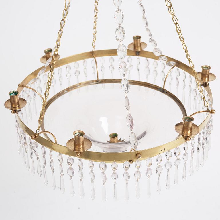 A late Gustavian gilt brass and cut glass seven-light chandelier, late 18th century.