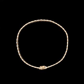 ARMKED, 14K guld. Kellomiehet 1976. Vikt ca 11,0 g.