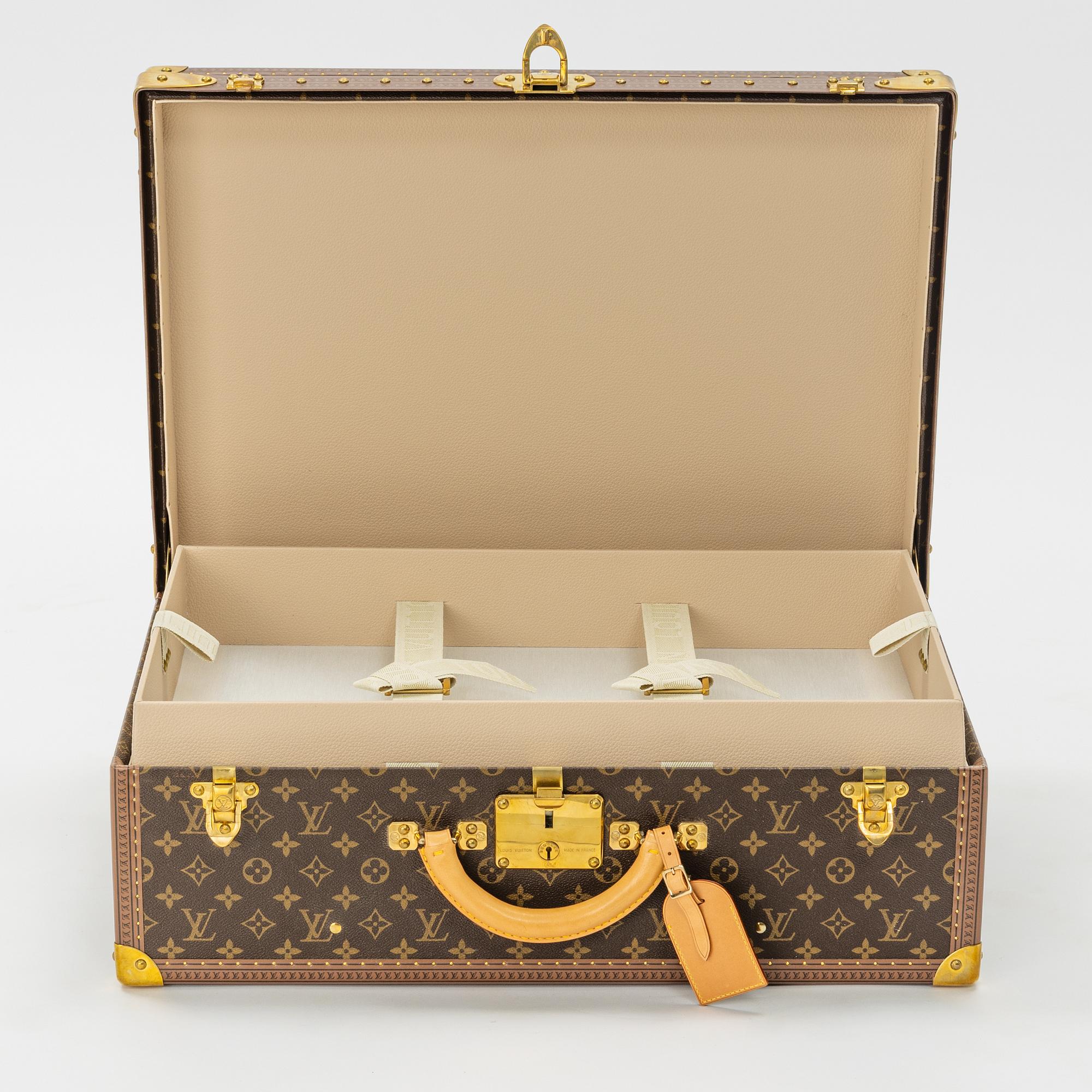 Louis Vuitton, A 'Alzer 60' travel bag, 2002.