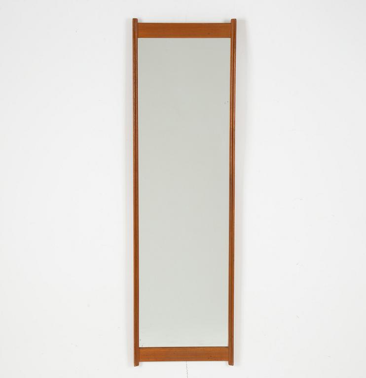 A 1960's teak mirror.