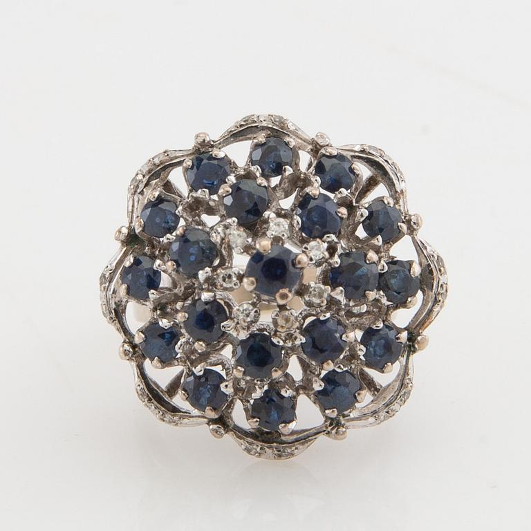 Ring 8K white gold with diamonds and sapphires.