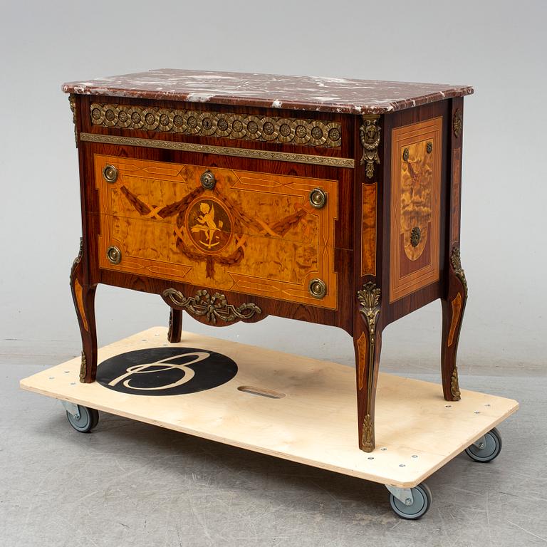 A Gustavian style chest of drawers, mid 20th Century.