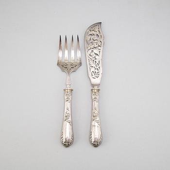 A pair of Louis VI-style serving cutlery, France 19th century.