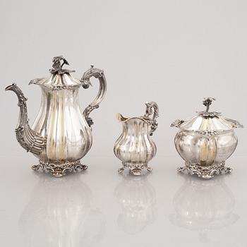 A Swedish Rococo Revival Coffee Pot, Creamer and Sugar Bowl, Petter Wigren, Malmö 1849.