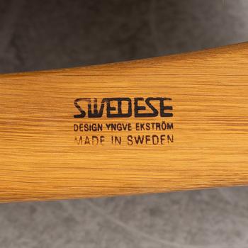 Yngve Ekström, a "Lamino" armchair with ottoman, Swedese, Sweden, late 20th century.