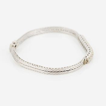 Bracelet in 18K white gold with brilliant-cut diamonds.