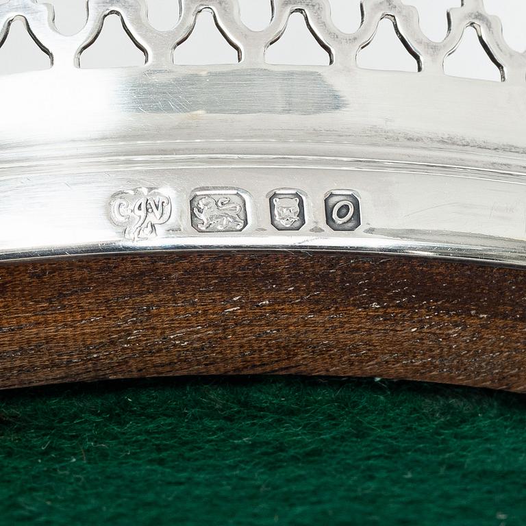 Two English silver coasters, mark of E Edmonds, Birmingham, 1930 and C J Vander Ltd, London 1969.