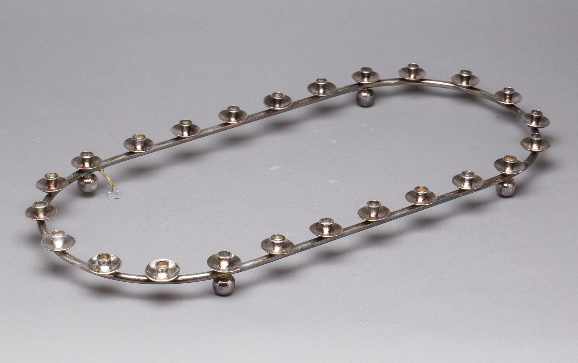 LJUSSTAKE, vitmetall, 1900-tal.