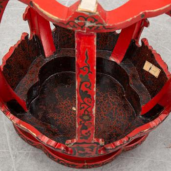 A Chinese red lacquer stool, first half of the 20th century.