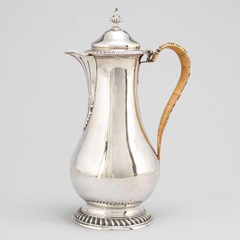 An English 18th century silver wine jug, mark of Augustin Le Sage, London 1770.