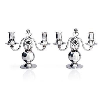 437B. Georg Jensen, a pair of sterling silver candelabra, Copenhagen 1933-44, design nr 324.