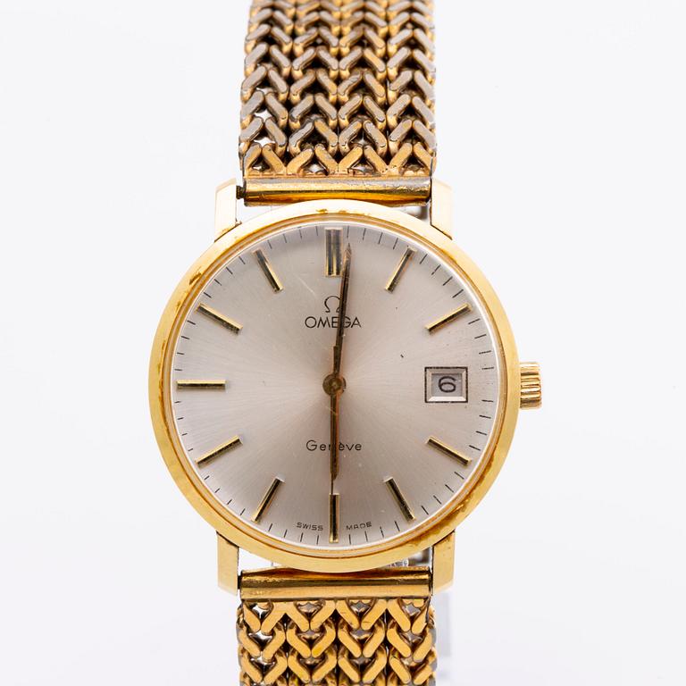 An Omega 14K gold wrist watch.