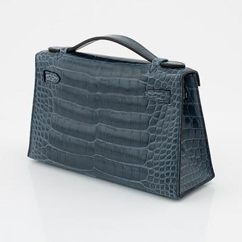 Hermès, A 'Kelly Pochette' in Shiny Alligator Mississippiensis Palladium Hardware, 2016.