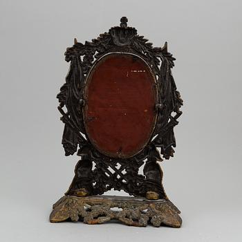 A cast iron table mirror from around year 1900.