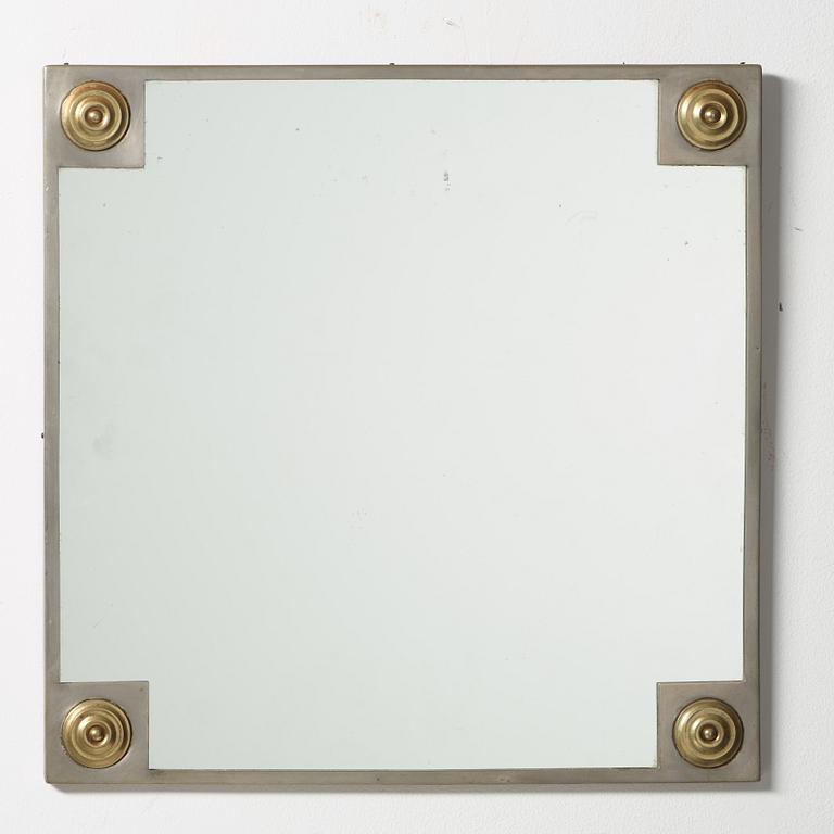 Firma Svenskt Tenn, a pewter and brass mirror, Stockholm 1928.