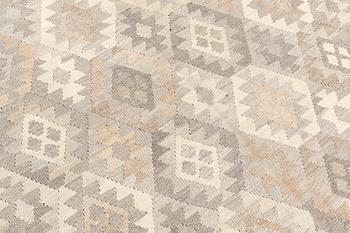 A Kilim carpet, ca 391 x 311 cm.