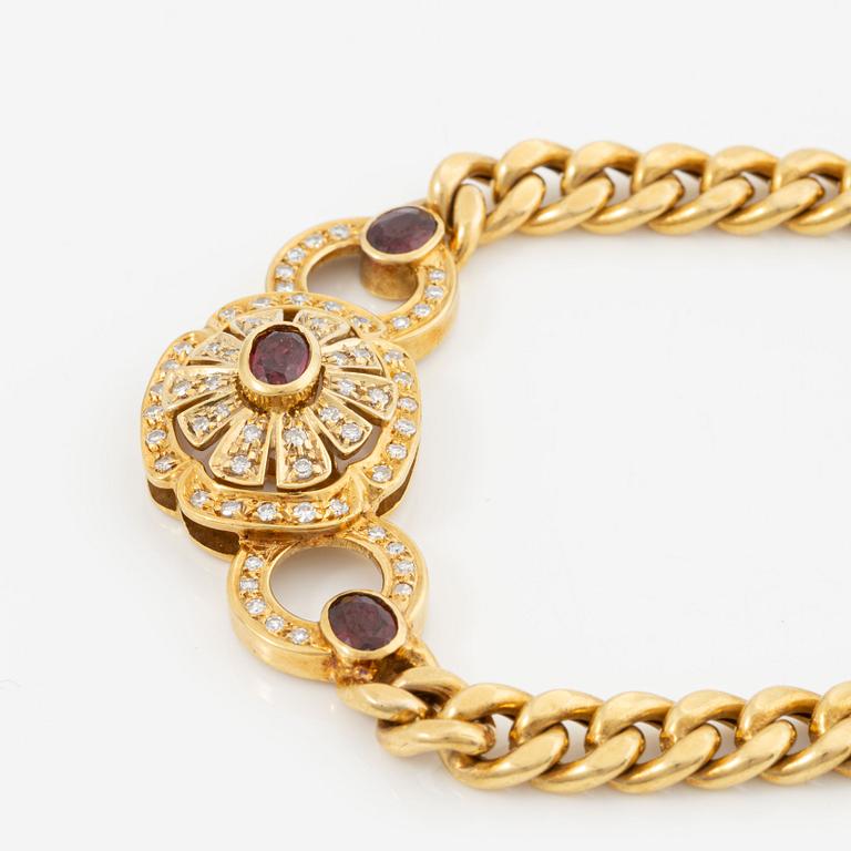 Necklace in 14K gold with faceted rubies and eight-cut diamonds.