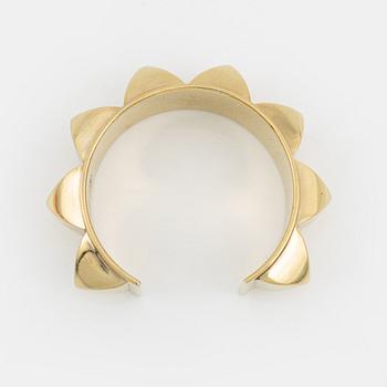 Hermès, a vintage gold tone stud bangle.