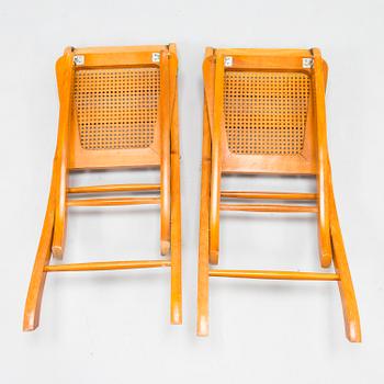 A pair of French folding chairs, Grange, latter half of the 20th century.