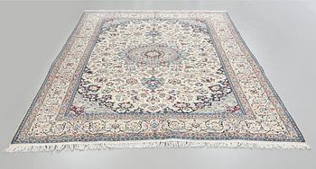 A Nain rug, part silk, old/semiantiqe, 307 x 209 cm.