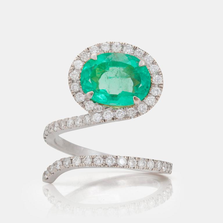 A 2.97ct emerald and brilliant cut diamond ring.