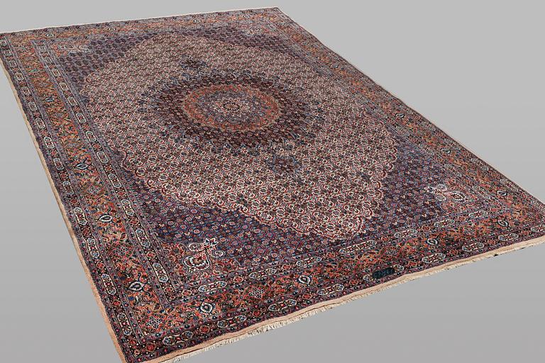 A carpet, Moud, signed, ca 385 x 268 cm.
