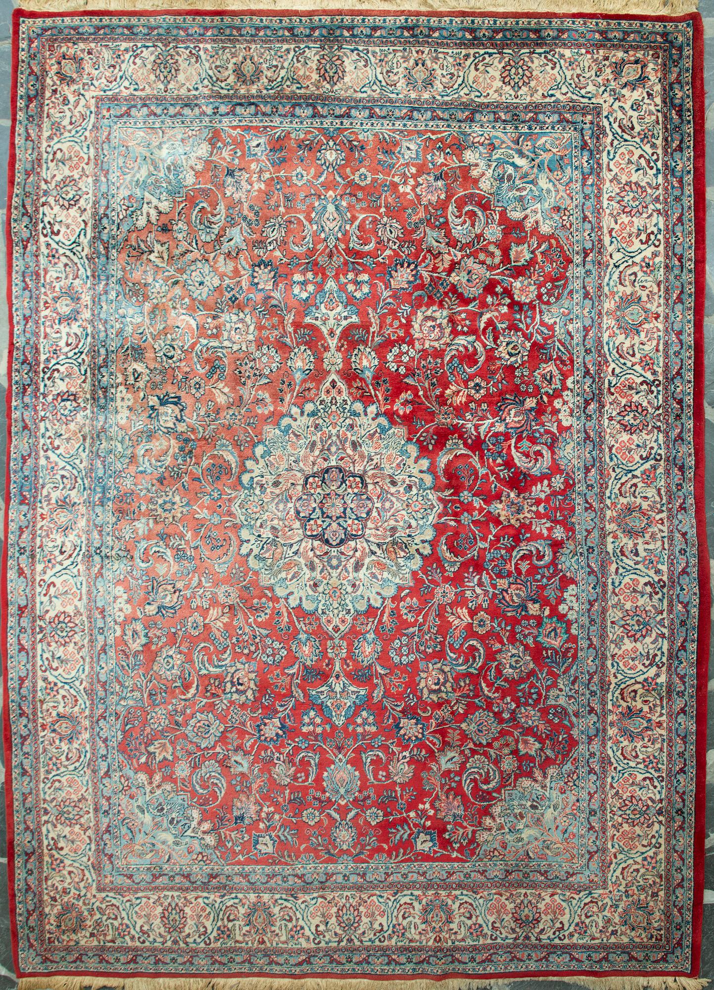 A carpet from Turkey. Circa 383x277 cm.