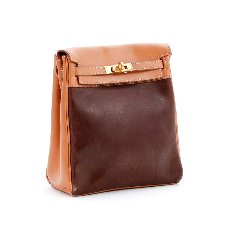 HERMÈS, a calf leather and brown Amazonia leather backpack, "Kelly Ado Backpack":.