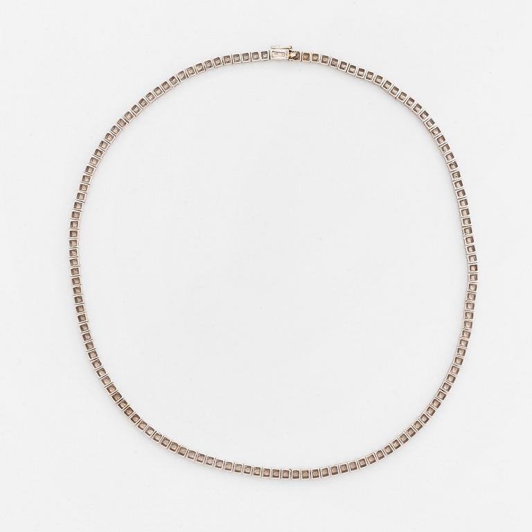 Collier rivière 18K vitguld runda briljantslipade diamanter.