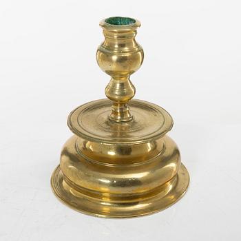 A Northern European baroque brass candlestick, late 17th century.