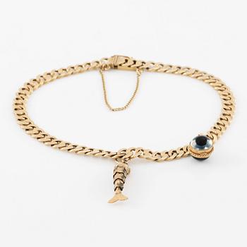 Arm bracelet with charms, 18K gold.