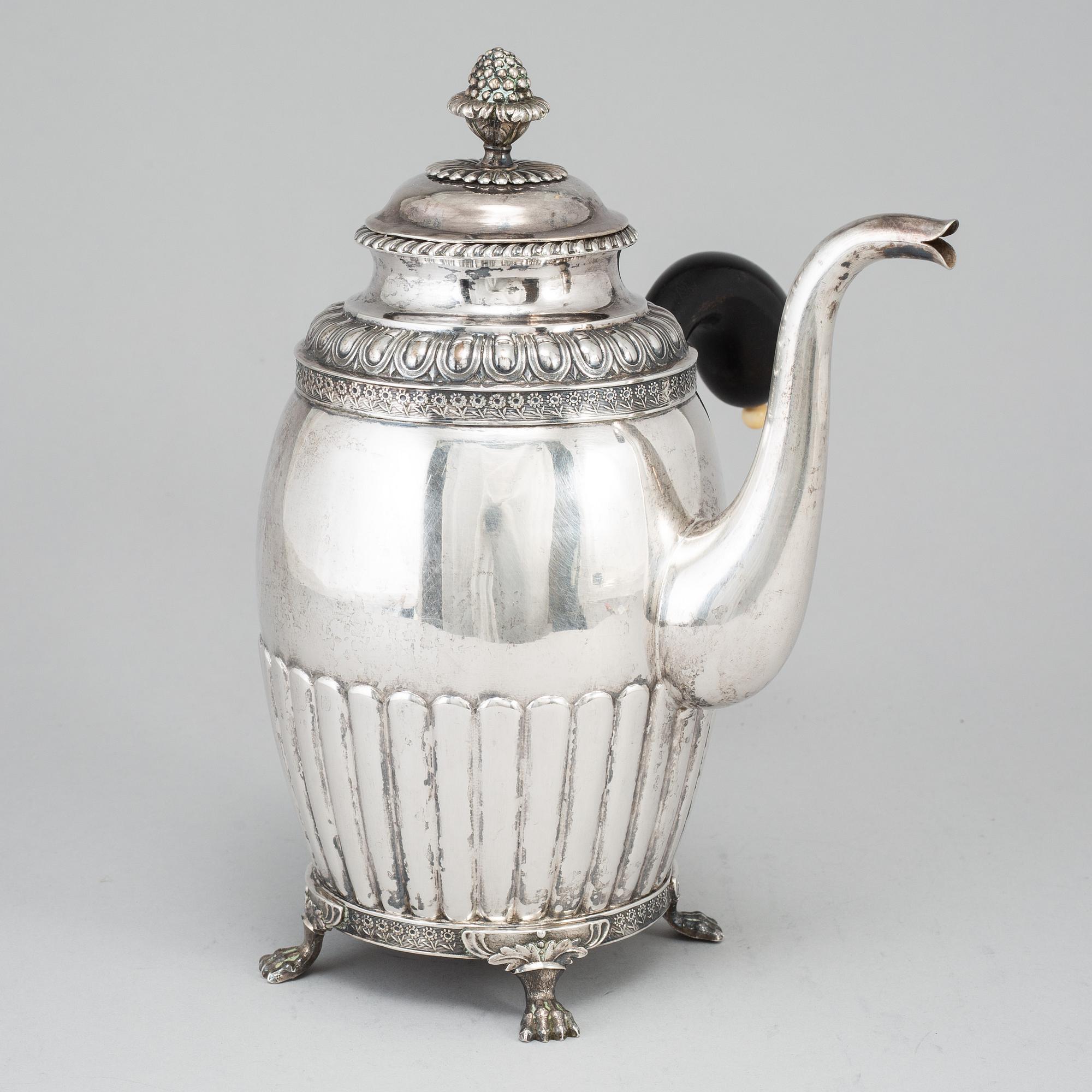 A silver coffee pot by Gustaf Folcker, Stockholm 1831.