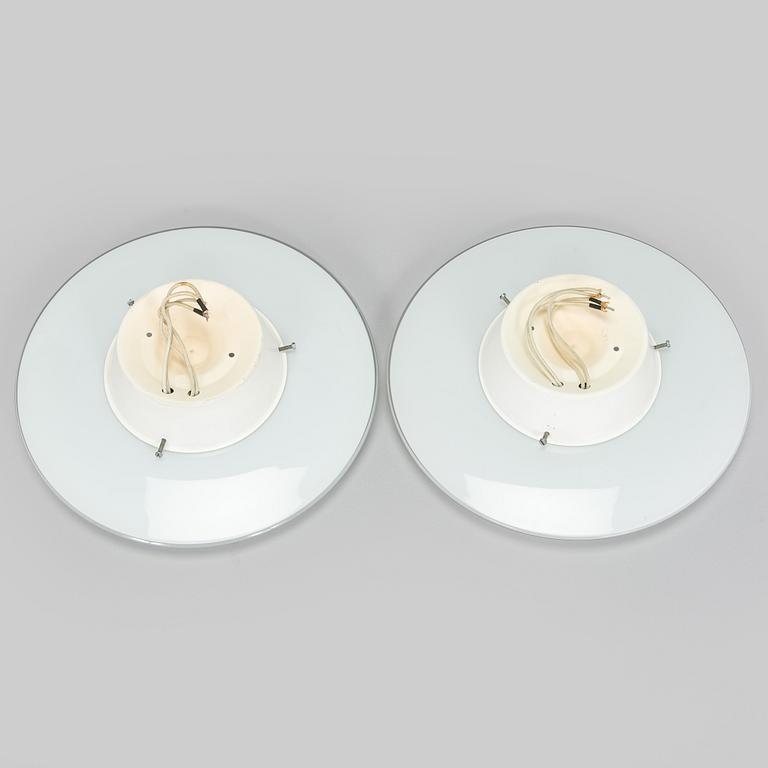 Arne Jacobsen, a pair of 1960's 'AJ-Eklipta' ceiling / wall lamps, for Louis Poulsen/licensed manufacturer Orno, Stockmann.