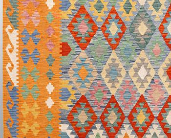 A kilim carpet, ca 342 x 256 cm.