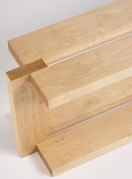 Nick Ross, an "Arrangement #16" coffe table/bench, executed in his studio, Stockholm, 2024.