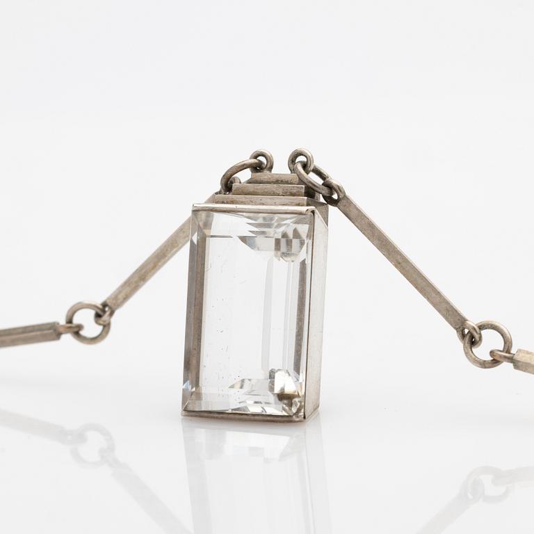 Wiwen Nilsson, Pendant, sterling silver with faceted rock crystal, Lund 1944.
