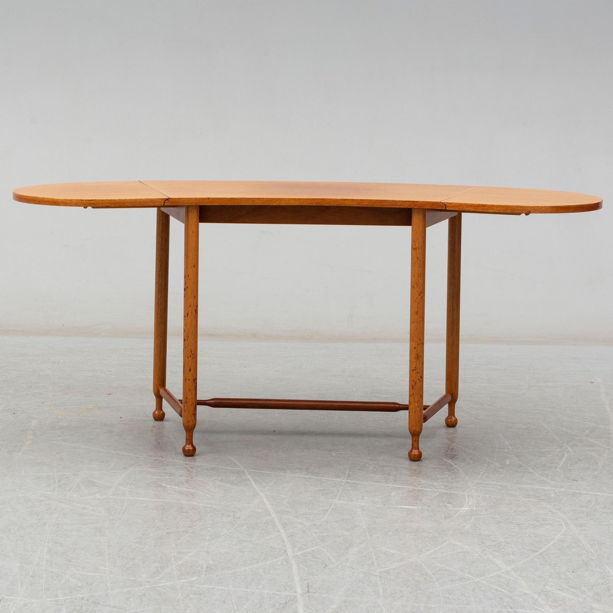 JOSEF FRANK, a model 1333 mahogany table from Firma Svenskt Tenn.