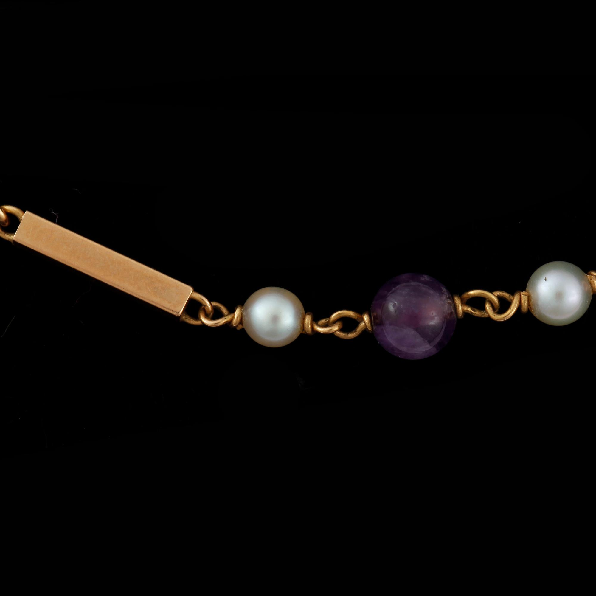 COLLIER, 18k guld, ametister och pärlor. Huskvarna Guldsmedsverkstad 1900-talets andra hälft. Tot ca 7 gram.
