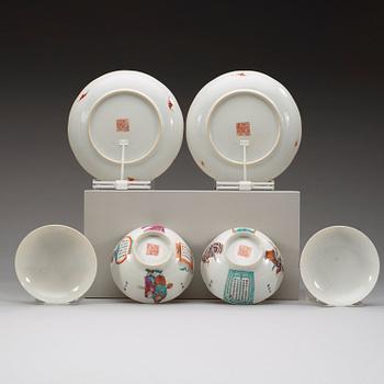 A pair of famille rose cups with saucers and covers, Qing dynasty with Dauguang mark, 19th century.