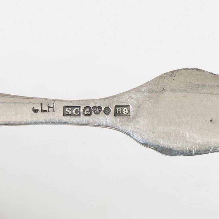 Bestick och servettringar, 9 delar, silver, bl a Gewe Silvervarufabriken Ab, Malmö 1952.