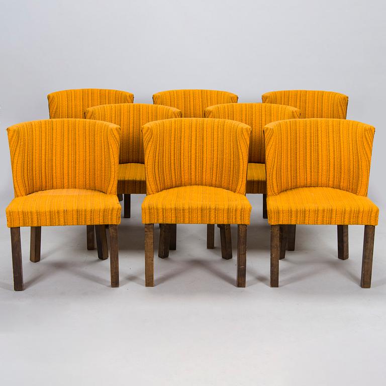 A Finnish 1930s dining table and eight chairs.