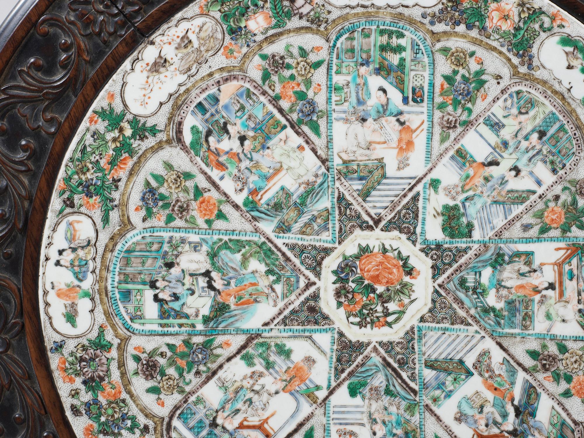 A hardwood and porcelain plaquette in famille verte  table, Qing dynasty 19th century.