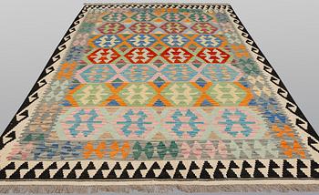 A kilim carpet, ca 290 x 200 cm.