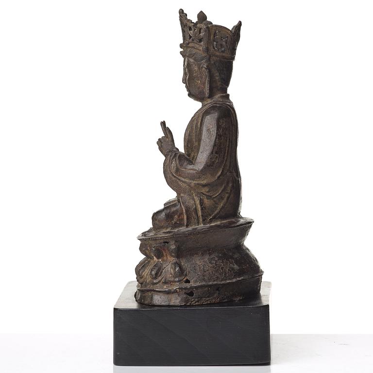 A bronze Vairocana Buddha, late Ming dynasty (1368-1644).