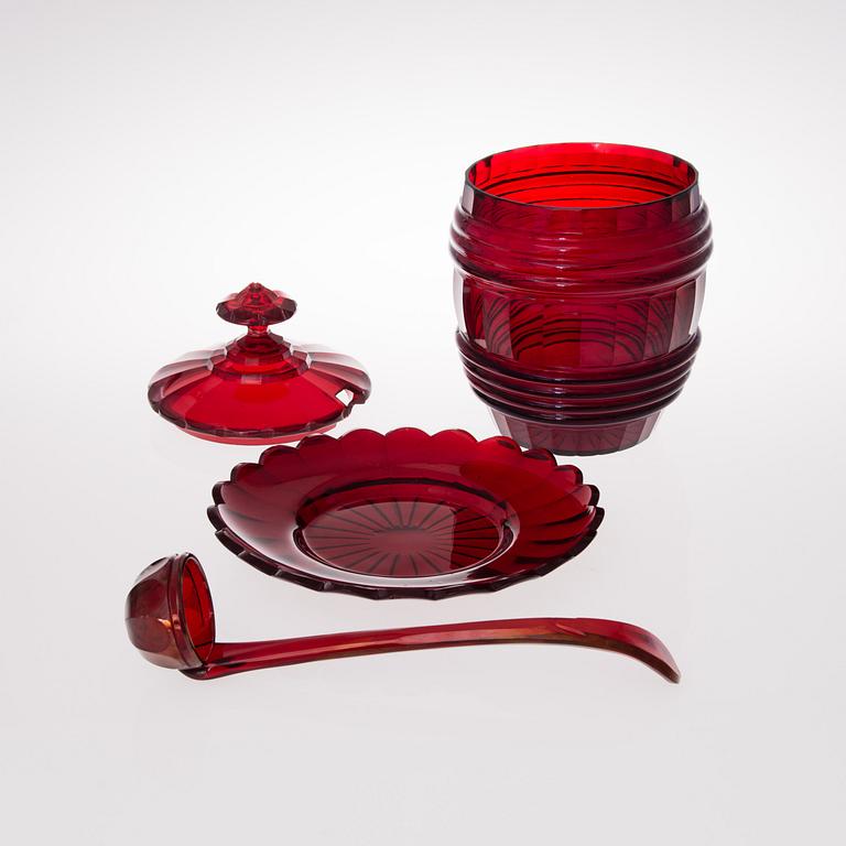 A RUSSIAN PUNCH BOWL WITH LADDLE, ruby glas, first half of the 19th century.