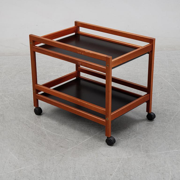 Børge Mogensen, a model '5370' teak and laminate trolley from Frederica Stolefabrik, Denmark.